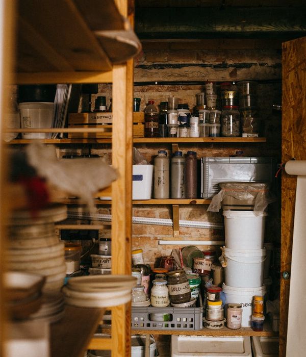 Organized storage room with labeled boxes and shelving systems